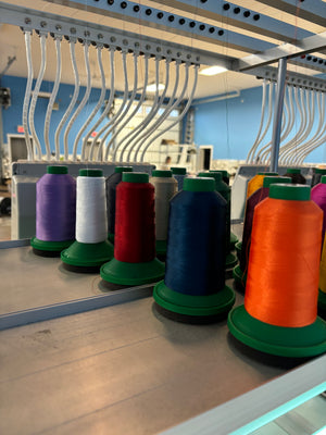 CUSTOM EMBROIDERED WITH MATERIAL/ONESIE