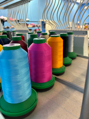 CUSTOM EMBROIDERED WITH MATERIAL/ONESIE