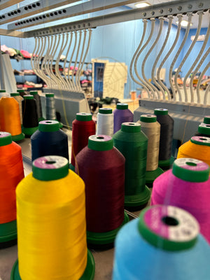 CUSTOM EMBROIDERED WITH MATERIAL/ONESIE